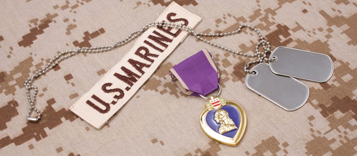 Purple Heart award on US MARINES camouflage uniform